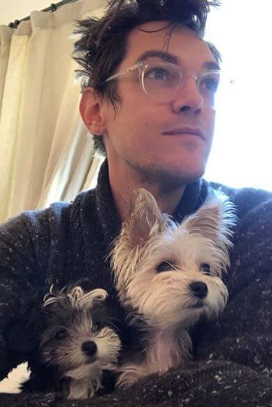 Christopher French with his puppies.